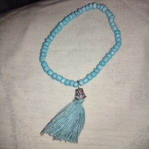 Elegant Beaded Bracelet with Tassel